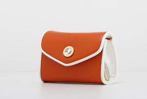 SCORE! Eva Designer Crossbody Clutch - Burnt Sienna Orange and White